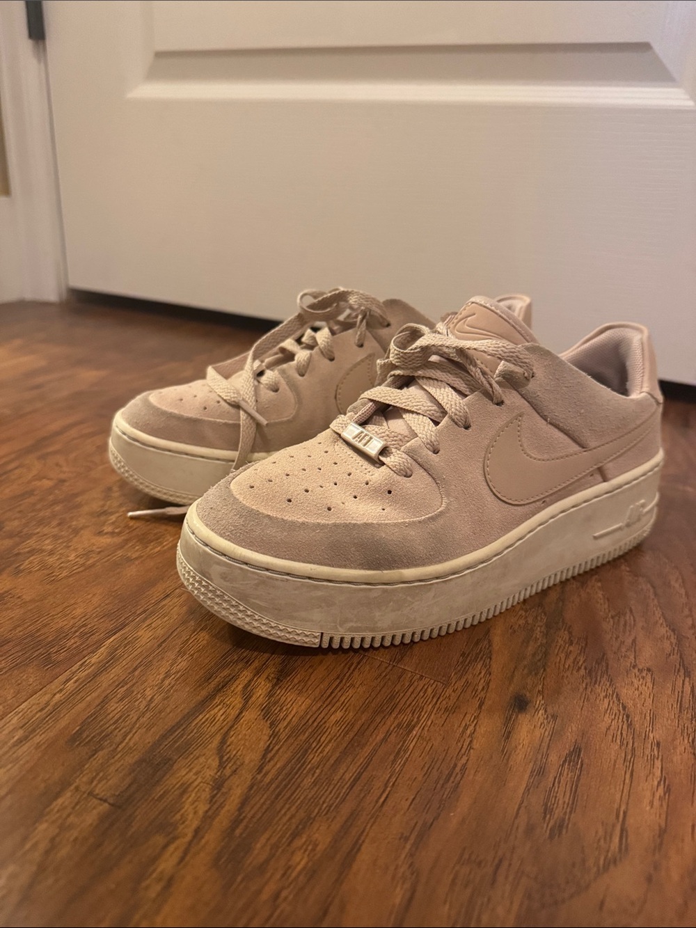 Nike Suede Platform Sneakers in Blush Pink.